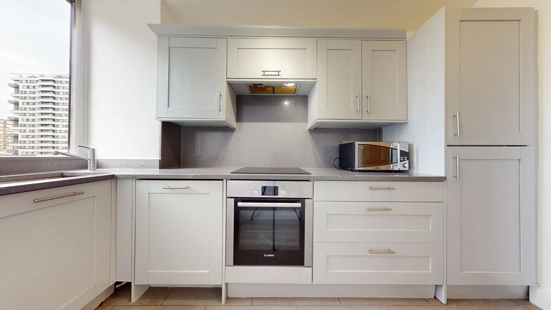 Hyde Park apartment kitchen with shaker cabinetry