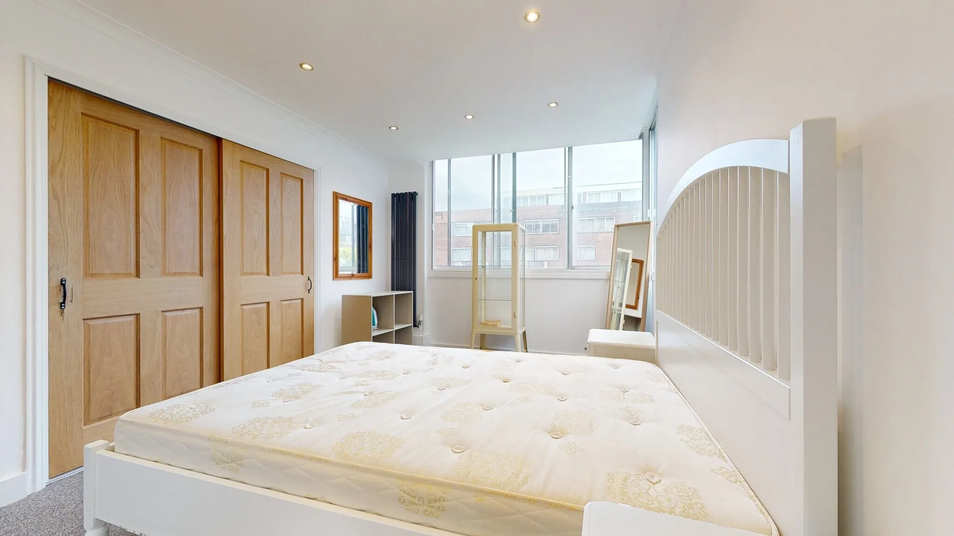 Hyde Park apartment principal bedroom with fitted wardrobes