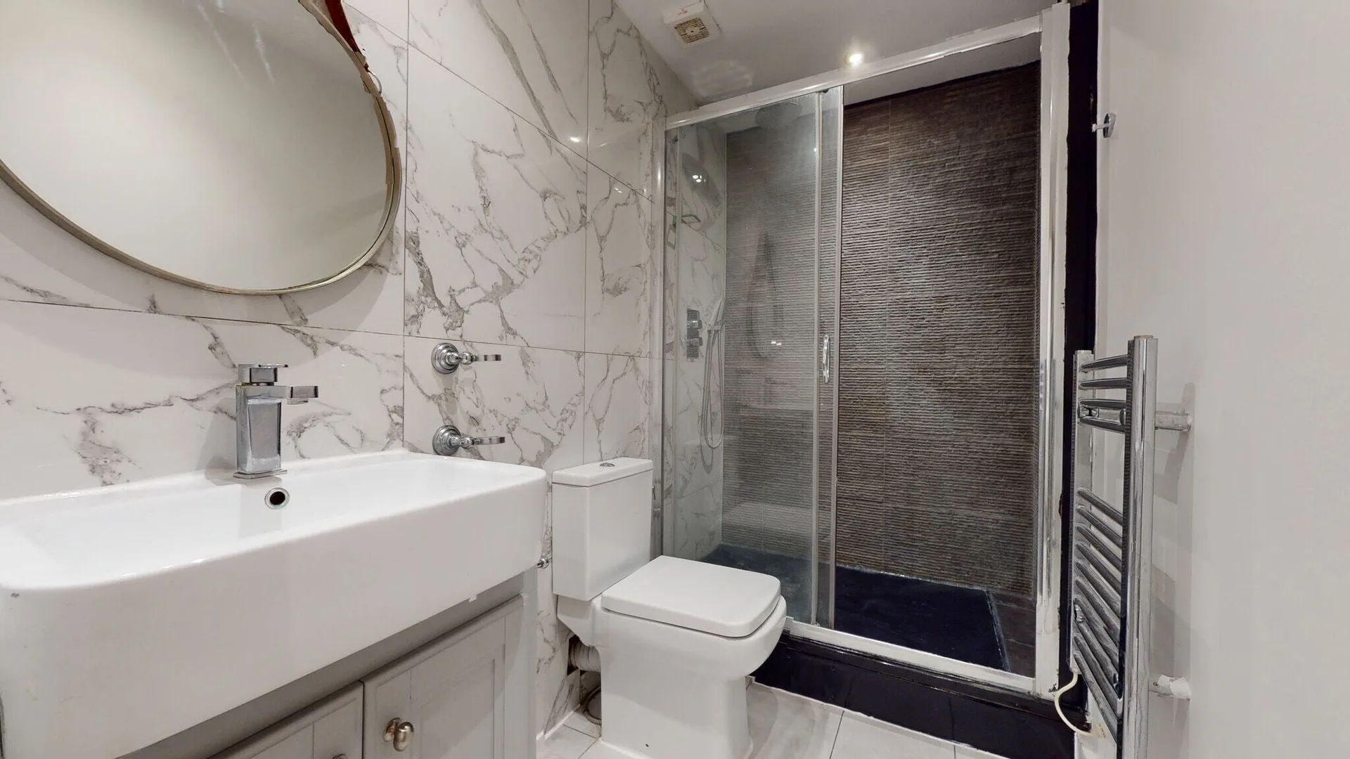 Hyde Park apartment marble shower room
