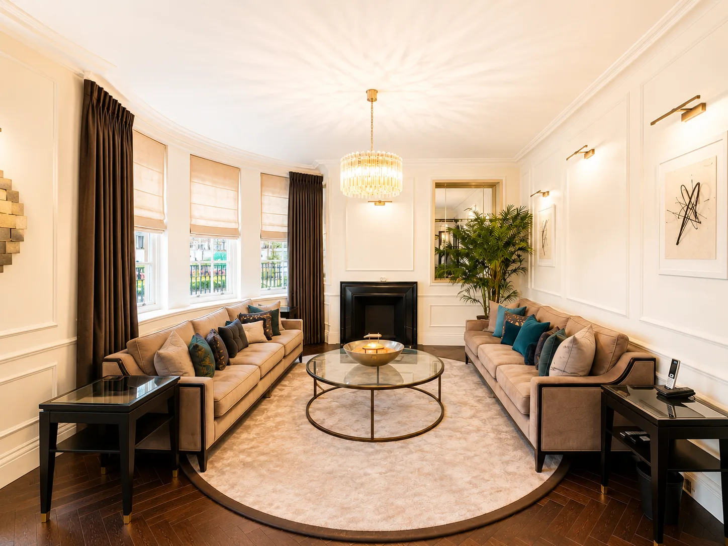 Mayfair apartment drawing room with twin sofas and a fireplace