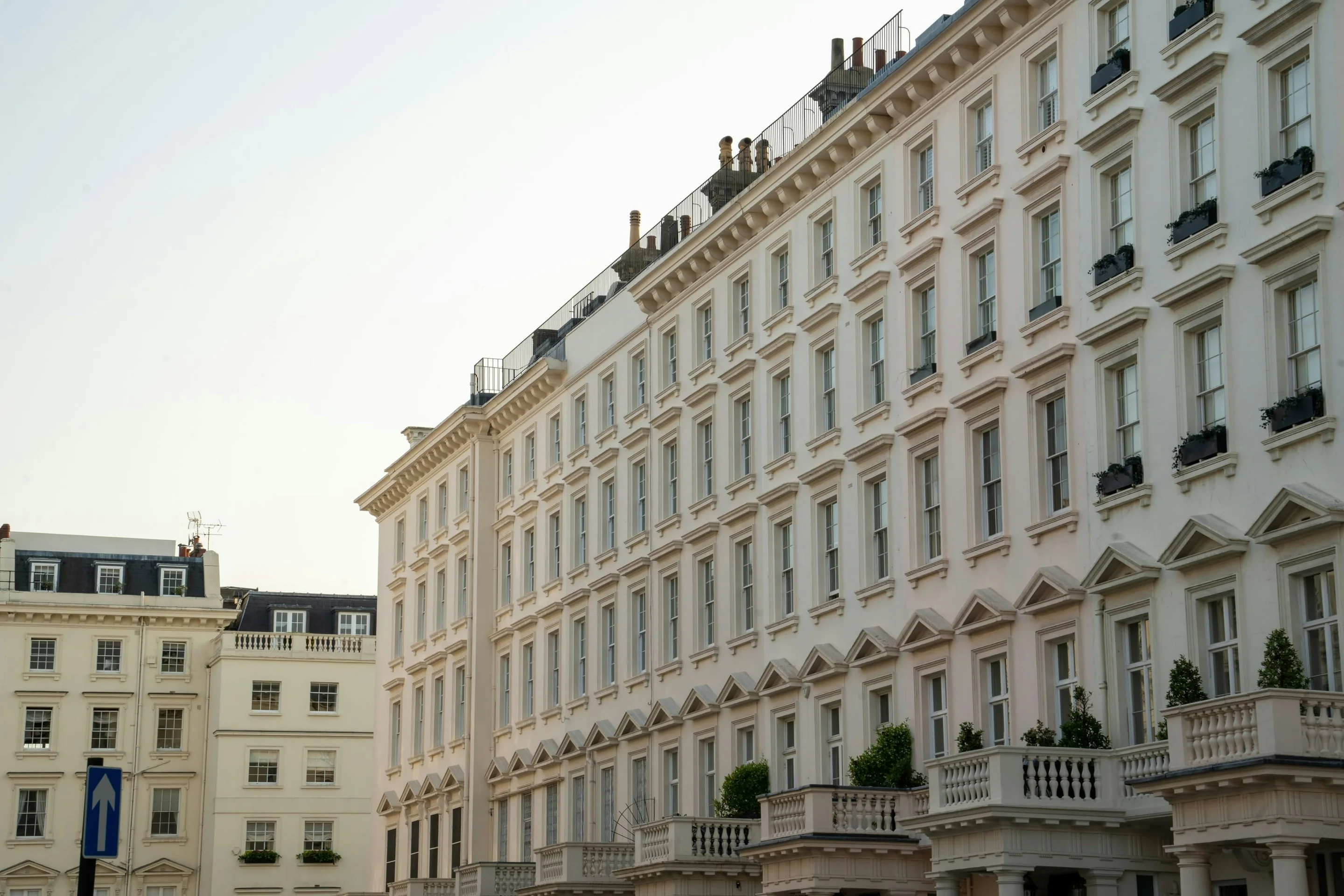 Cream stucco terrace with balconies in Prime Central London