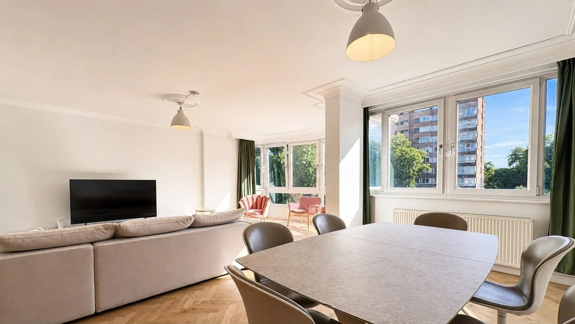 Hyde Park apartment dining area with a stone table