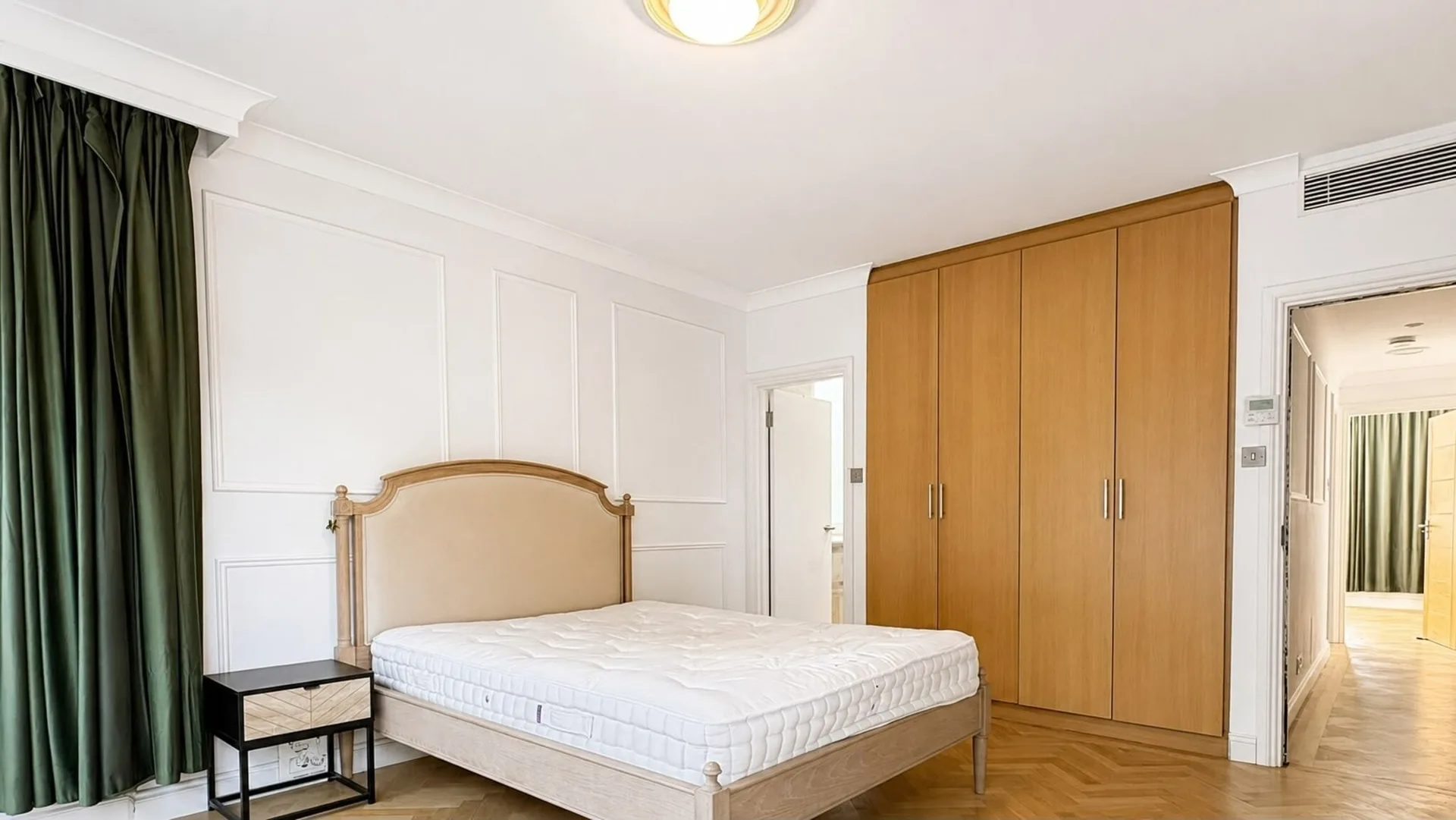Hyde Park apartment second bedroom with fitted wardrobes