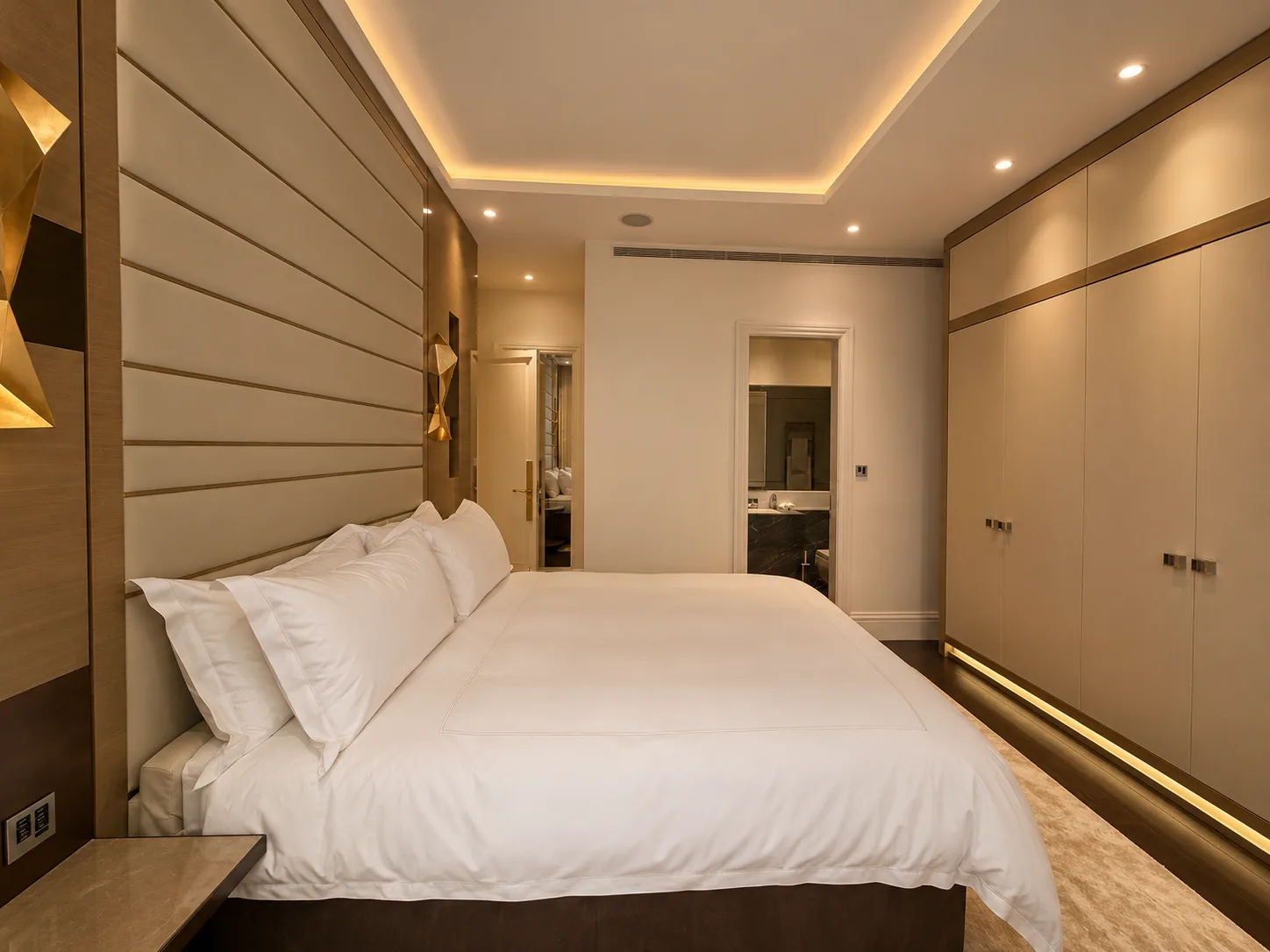 Mayfair apartment third bedroom with a wall-mounted headboard